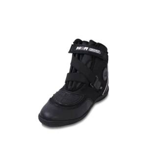 Botín de motociclista HGR Urban Soft, diseño negro con correas cruzadas, ideal para uso urbano diario.